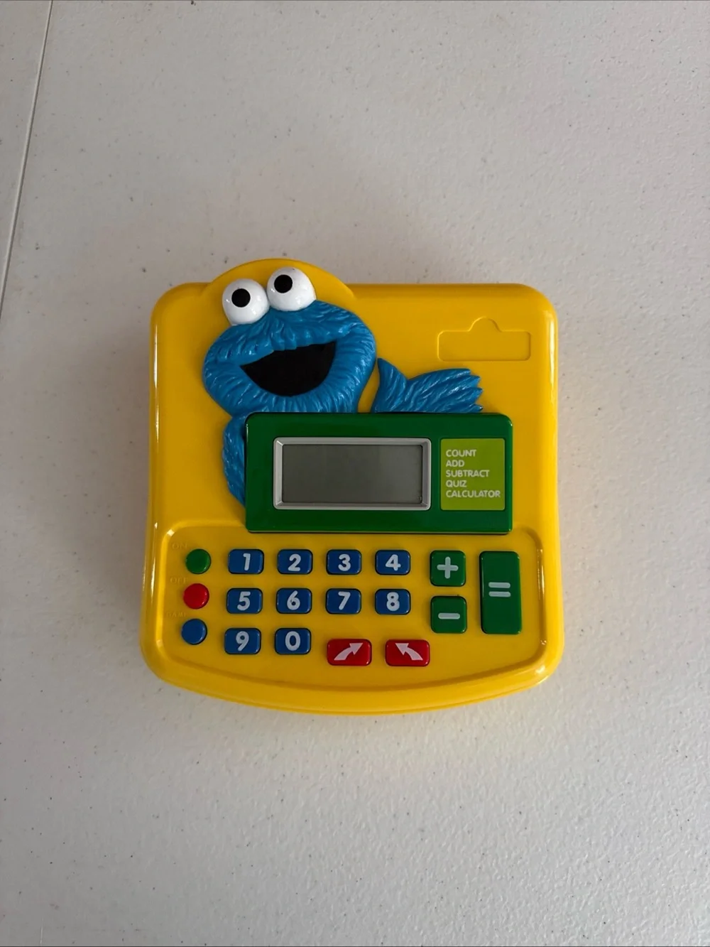 Fisher-Price Yellow Kids Calculator Toy with Blue Cookie Character